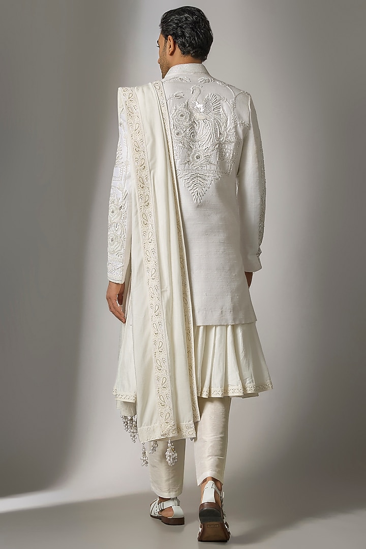 White Raw Silk Cutdana Embroidered Groom Sherwani Set by PARV DESIGN STUDIO at Pernia's Pop Up Shop