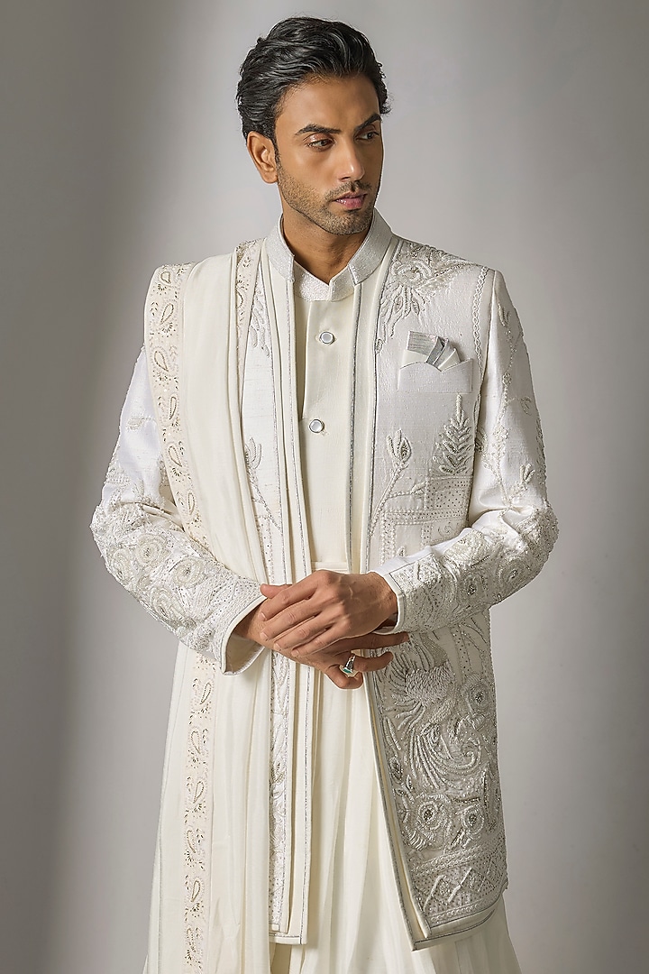 White Raw Silk Cutdana Embroidered Groom Sherwani Set by PARV DESIGN STUDIO at Pernia's Pop Up Shop