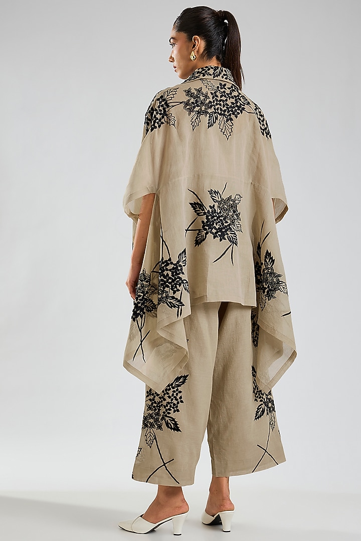 Natural Beige & Black Handloom Cotton Thread Embroidered Cape by Peachoo at Pernia's Pop Up Shop
