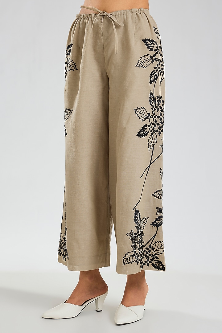 Natural Beige & Black Handloom Cotton Thread Embroidered Pants by Peachoo at Pernia's Pop Up Shop
