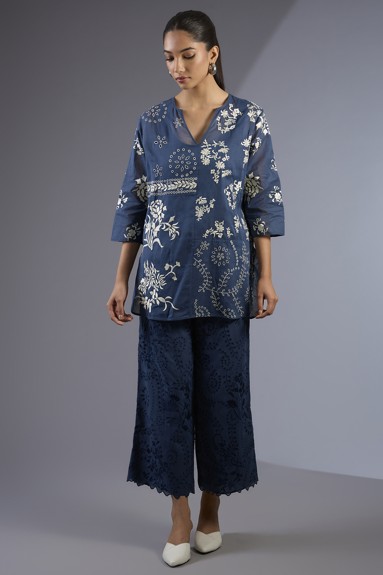 Space Blue & Ecru Handloom Thread Embroidered Top by Peachoo at Pernia's Pop Up Shop