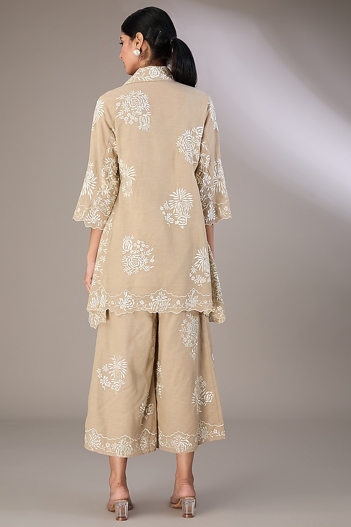 Beige Handloom Cotton Thread Embroidered Tunic by Peachoo at Pernia's Pop Up Shop