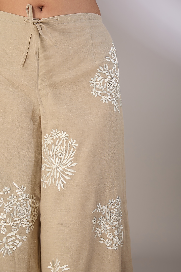 Beige Handloom Cotton Thread Embroidered Pants by Peachoo at Pernia's Pop Up Shop
