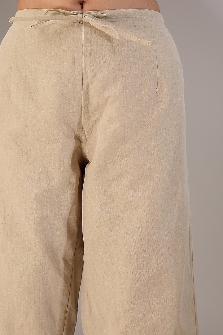 Beige Handloom Cotton Thread Embroidered Pants by Peachoo at Pernia's Pop Up Shop