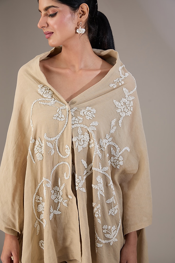 Beige Handloom Cotton Beads Embroidered Cape by Peachoo at Pernia's Pop Up Shop