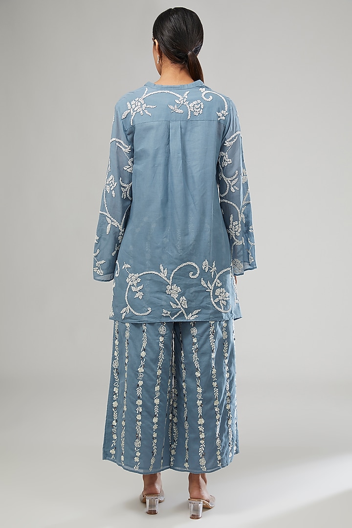 Blue Handloom Cotton Thread Embroidered Top by Peachoo at Pernia's Pop Up Shop