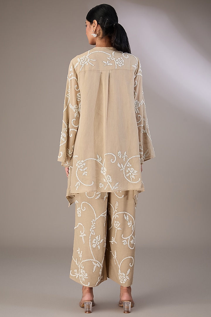 Beige Handloom Cotton Thread Embroidered Top by Peachoo at Pernia's Pop Up Shop