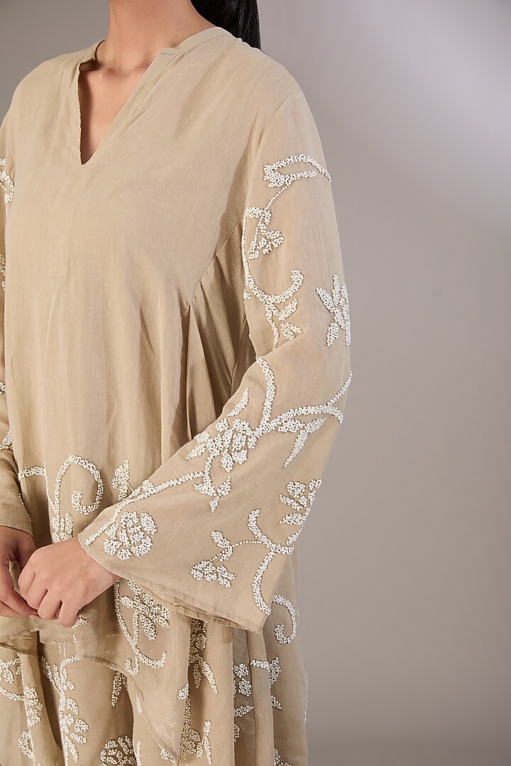 Beige Handloom Cotton Thread Embroidered Top by Peachoo at Pernia's Pop Up Shop