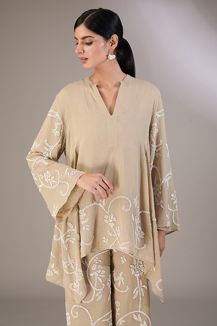 Beige Handloom Cotton Thread Embroidered Top by Peachoo at Pernia's Pop Up Shop