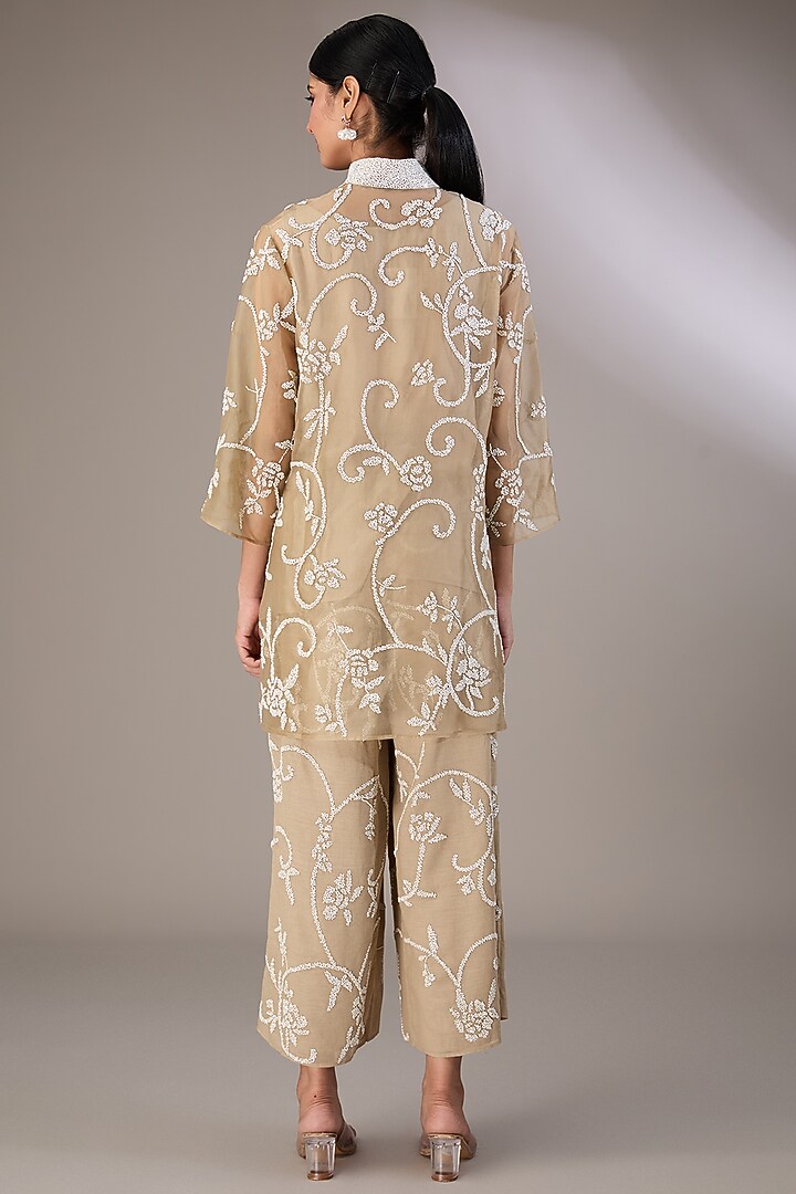 Beige Handloom Cotton Bead Embroidered Pants by Peachoo at Pernia's Pop Up Shop