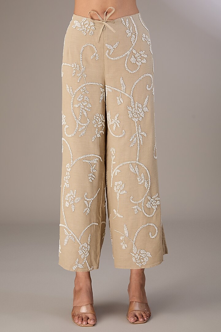 Beige Handloom Cotton Bead Embroidered Pants by Peachoo at Pernia's Pop Up Shop