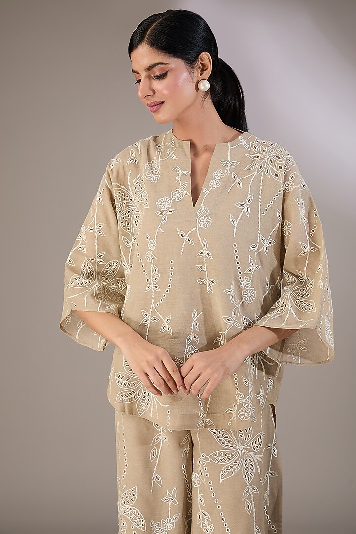 Beige Handloom Cotton Thread Embroidered Top by Peachoo at Pernia's Pop Up Shop