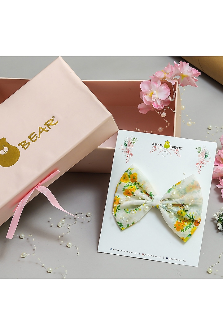 Off white & Yellow Chanderi Floral Printed Bow Hair Clip For Girls by PEAR BEAR at Pernia's Pop Up Shop