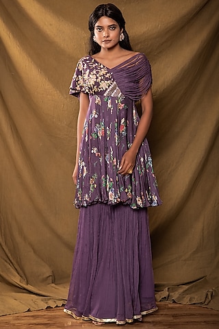 WINE BURGUNDY FLARED PALAZZO PANT SET PAIRED WITH A FLORAL PRINTED DRAPED  TOP AND AN EMBROIDERED BELT. - Seasons India