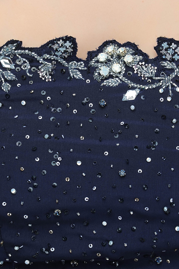 Navy blue floral cutwork flared jumpsuit available only at Pernia's Pop Up Shop.