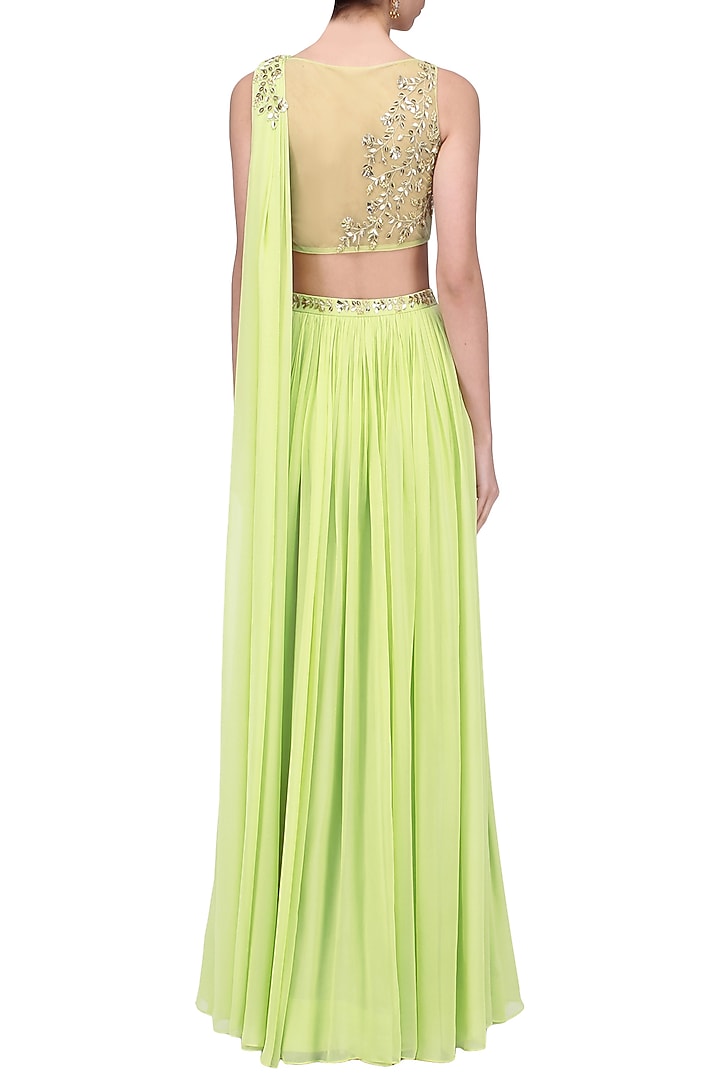 Lime green mukaish and cutdana work draped lehenga set available only at Pernia's Pop Up Shop.