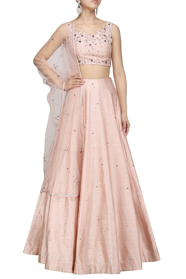 Soft peach crystal and beads embellished lehenga set only at Pernia's Pop Up Shop.