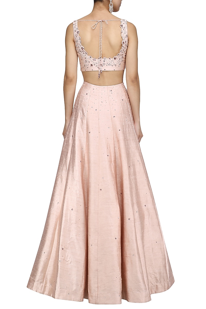 Soft peach crystal and beads embellished lehenga set only at Pernia's Pop Up Shop.