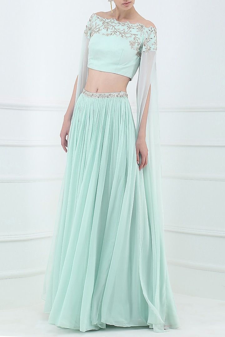Pastel blue embroidered off shoulder crop top with lehenga skirt available  only at Pernia's Pop Up