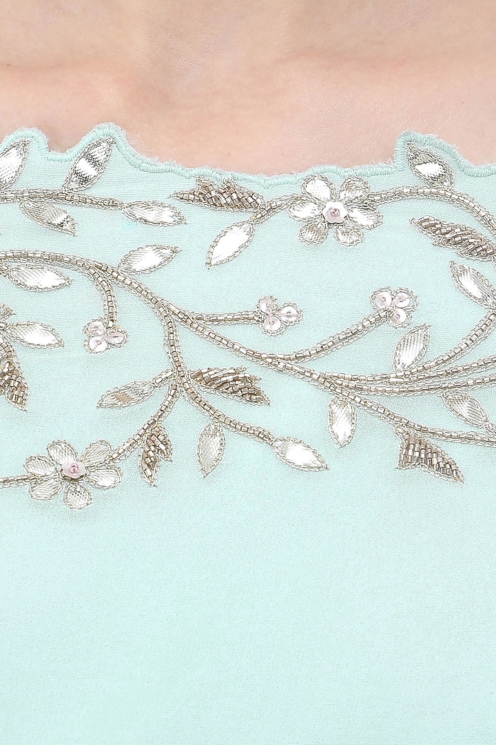 Pastel blue embroidered off shoulder crop top with lehenga skirt available only at Pernia's Pop Up Shop.