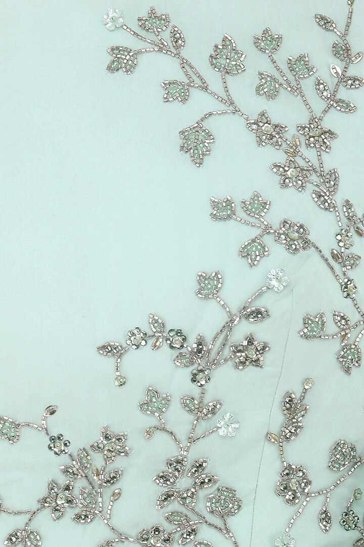 Pastel blue embroidered crop top with lehenga skirt available only at Pernia's Pop Up Shop.