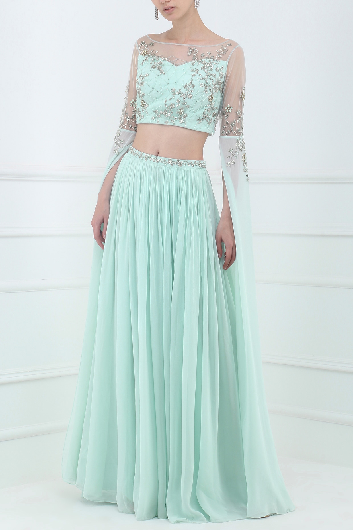 Cold shoulder peach crop top with layered satin skirt only on Kalki