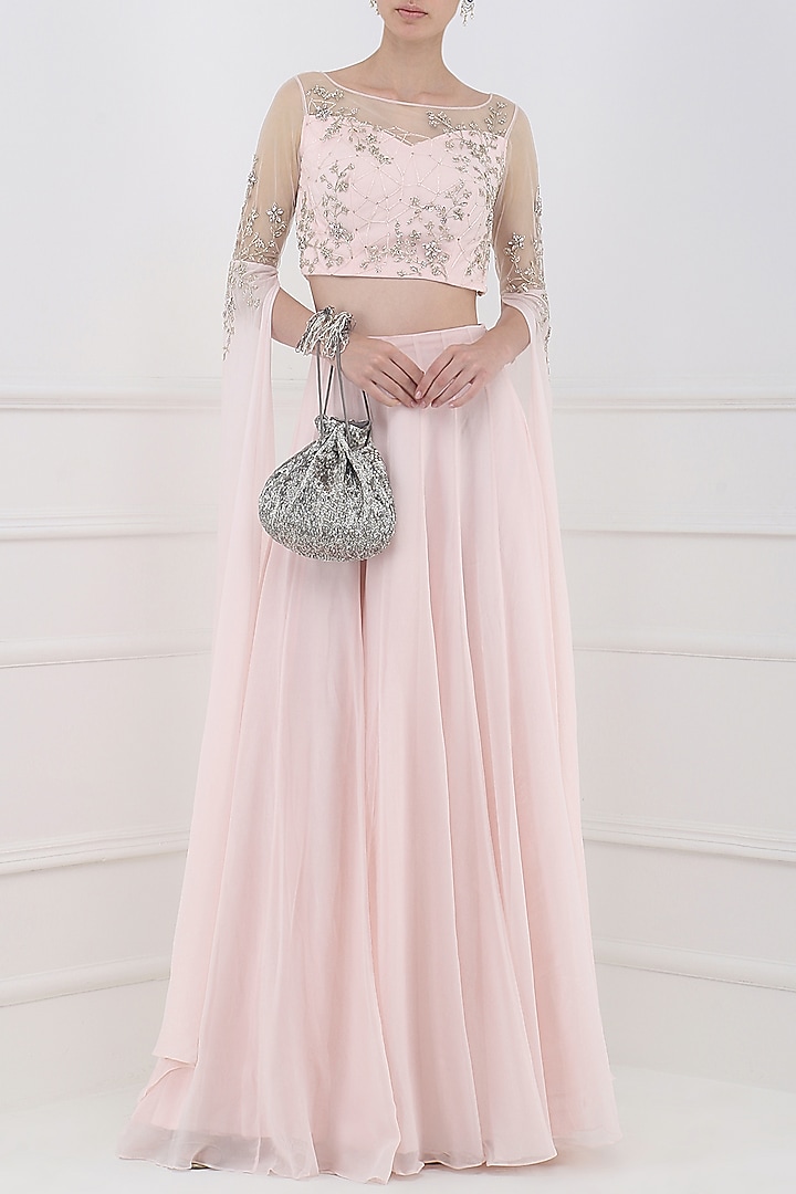 Pastel pink embroidered cape sleeves crop top with lehenga skirt available only at Pernia's Pop Up Shop.