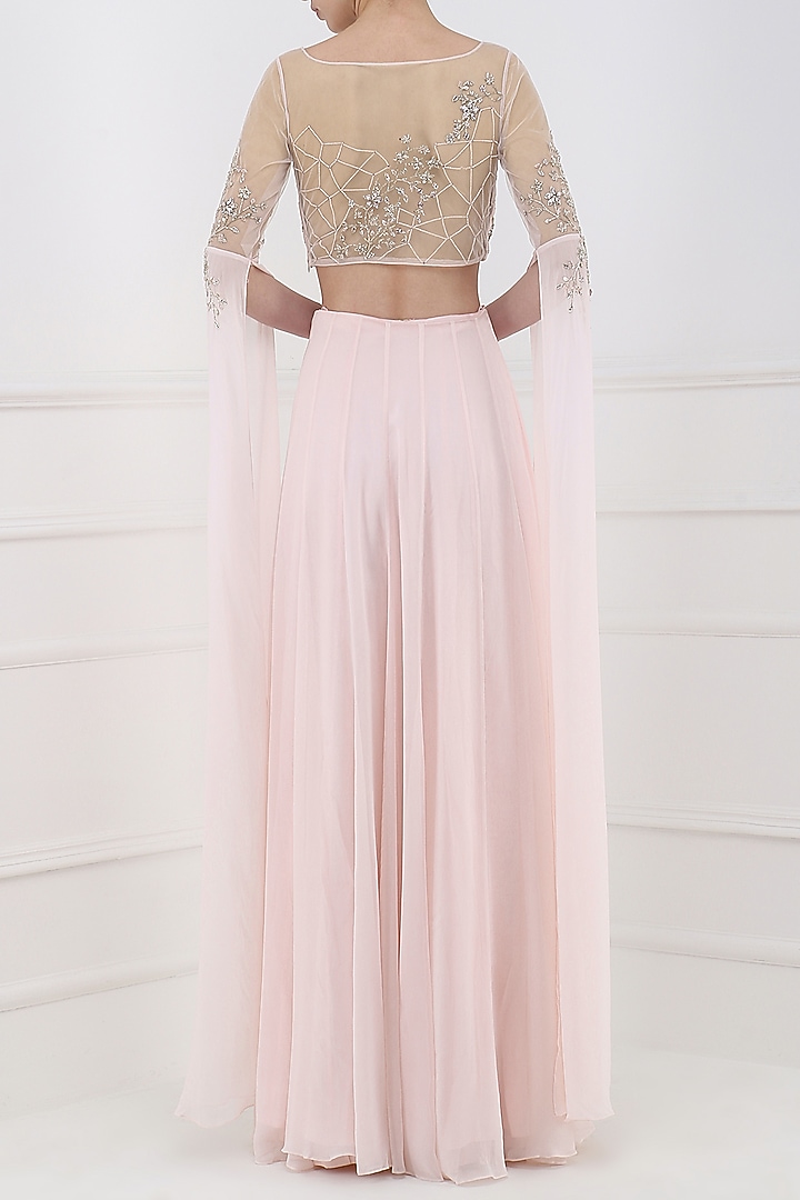 Pastel pink embroidered cape sleeves crop top with lehenga skirt available only at Pernia's Pop Up Shop.