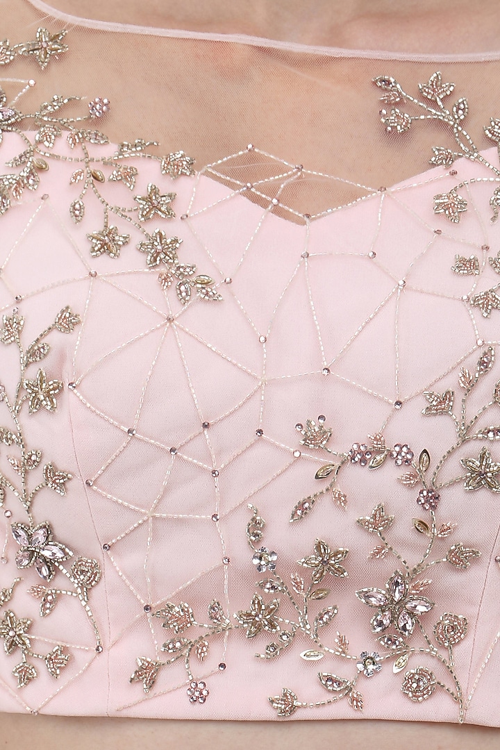 Pastel pink embroidered cape sleeves crop top with lehenga skirt available only at Pernia's Pop Up Shop.
