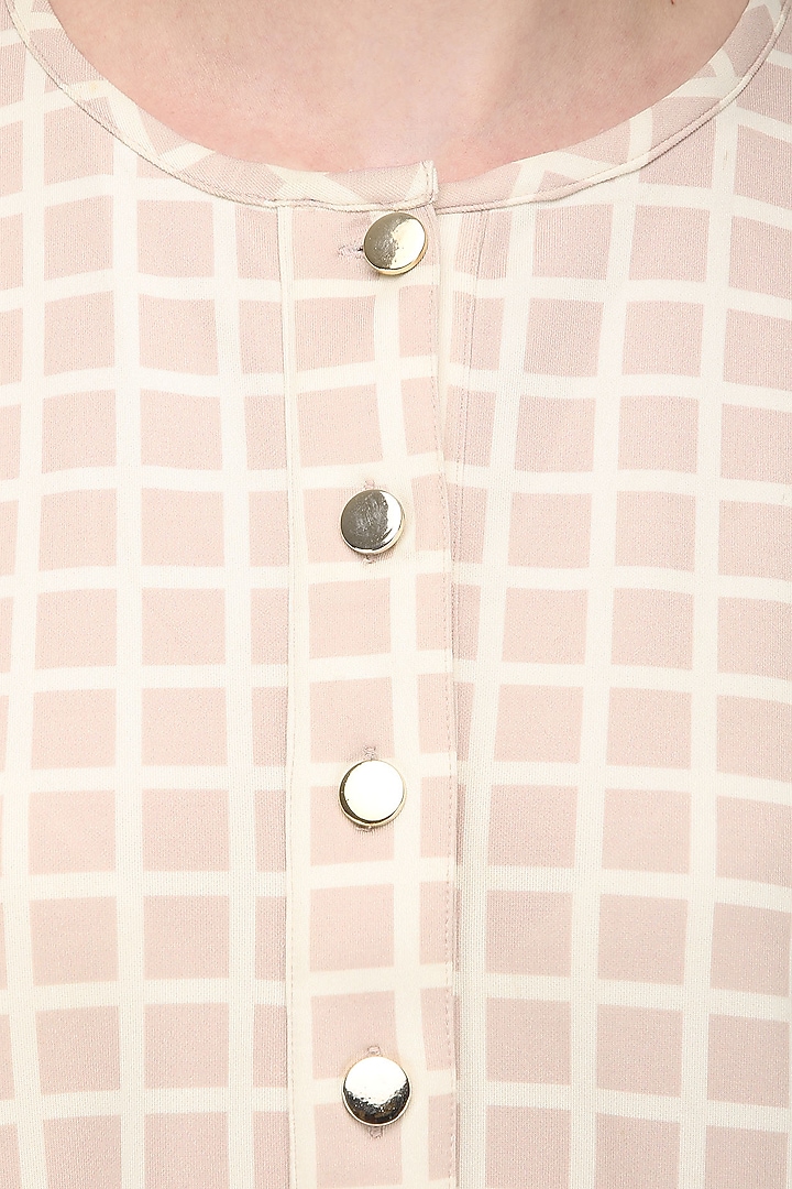 A pink scuba georgette shift dress with checks and strips available only at Pernia's Pop Up Shop.