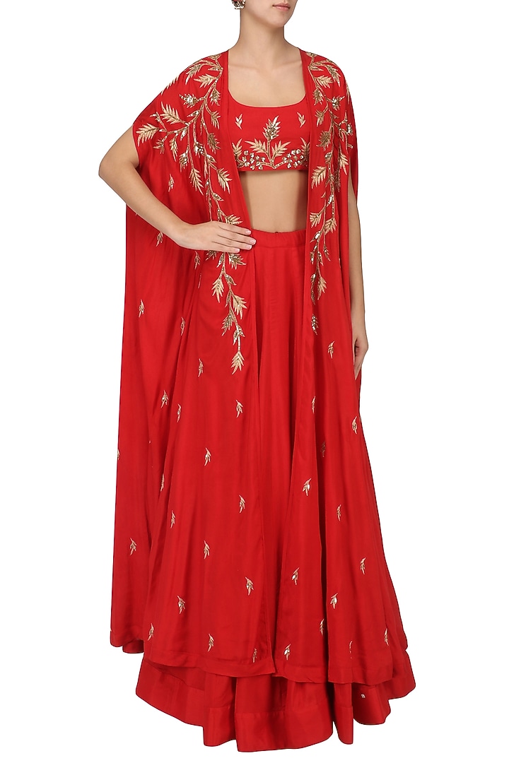Red lehenga and embroidered cape set available only at Pernia's Pop Up Shop.