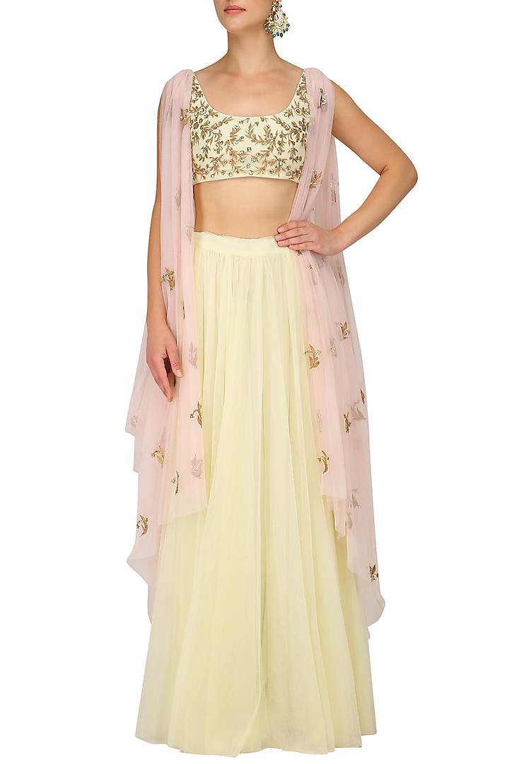 Pale Yellow and Pink Cowl Drape Blouse with Lehenga Skirt by Prathyusha Garimella