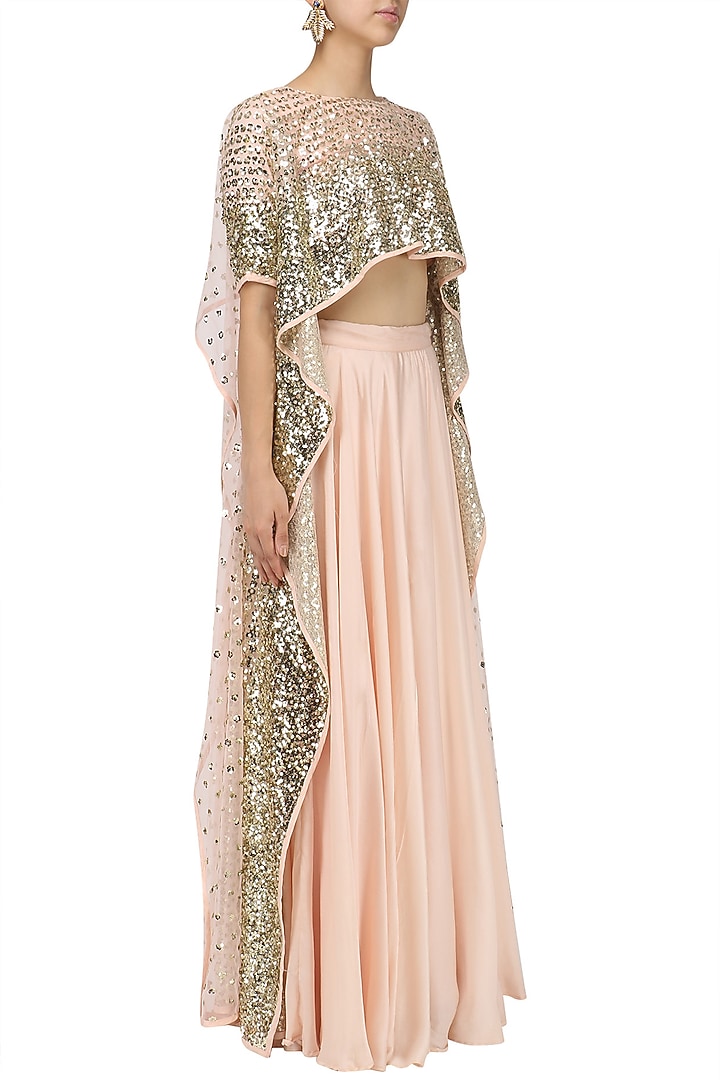 Pink embroidered high low top and lehenga skirt available only at Pernia's Pop Up Shop.