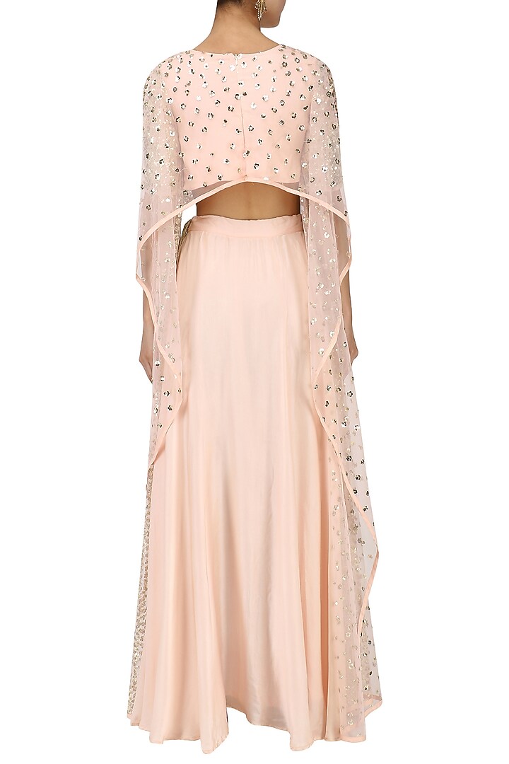 Pink embroidered high low top and lehenga skirt available only at Pernia's Pop Up Shop.