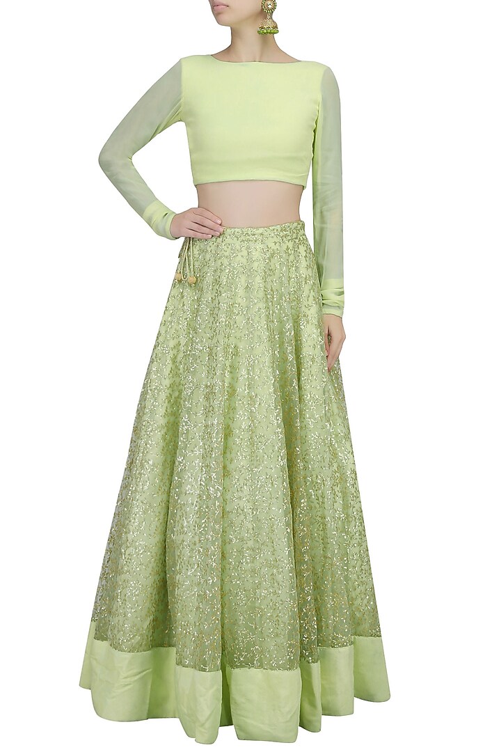 Mint green and gold leaves pattern sequins and zari embroidered lehenga set available only at Pernia's Pop Up Shop.