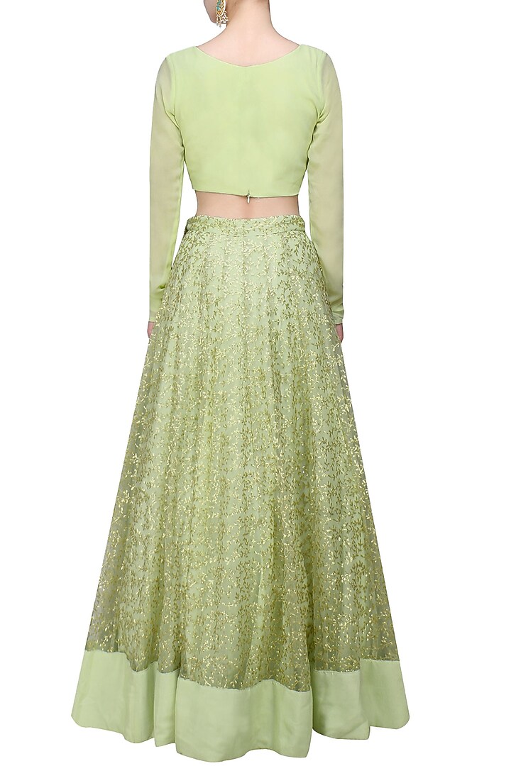 Mint green and gold leaves pattern sequins and zari embroidered lehenga set available only at Pernia's Pop Up Shop.