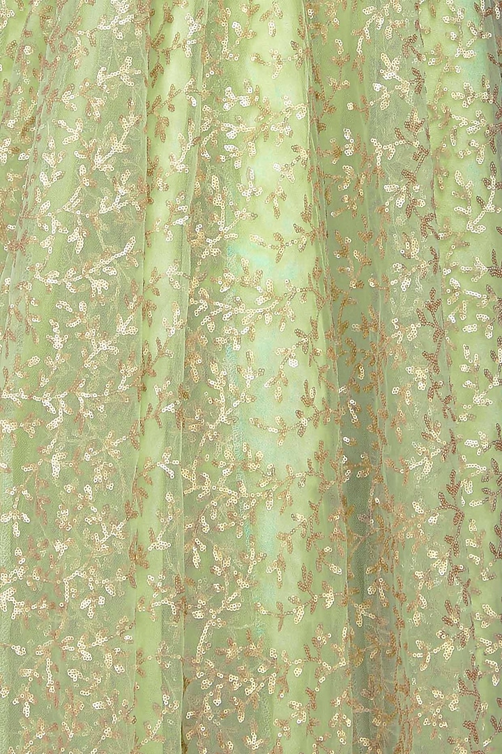 Mint green and gold leaves pattern sequins and zari embroidered lehenga set available only at Pernia's Pop Up Shop.