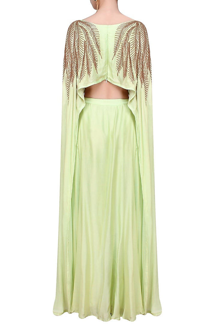 Mint green and gold leaves beads embroidered cape and lehenga set available only at Pernia's Pop Up Shop.