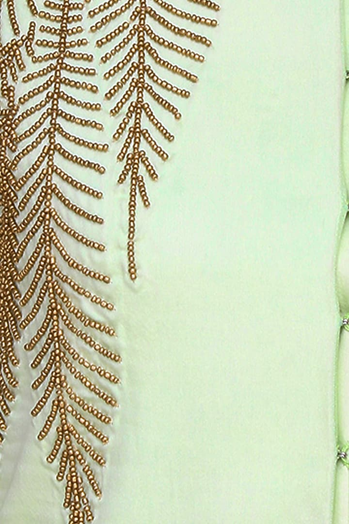 Mint green and gold leaves beads embroidered sherwani and black dhoti pants set available only at Pernia's Pop Up Shop.