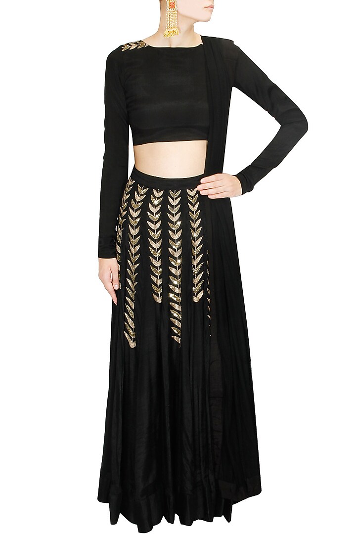 Black ferns embellished crop top and lehenga skirt available only at Pernia's Pop Up Shop.
