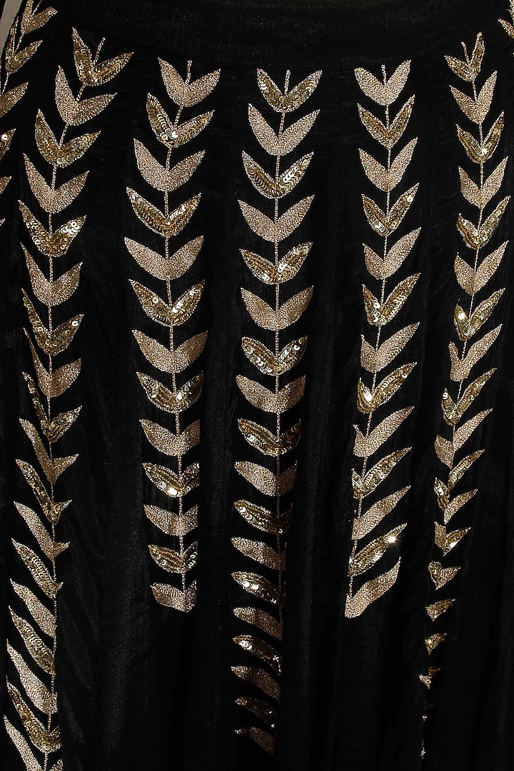 Black ferns embellished crop top and lehenga skirt available only at Pernia's Pop Up Shop.