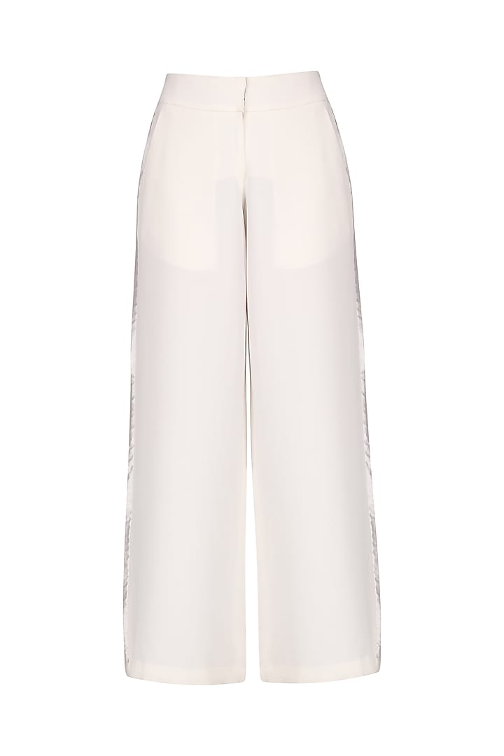 Ivory satin line palazzo pants available only at Pernia's Pop Up Shop.