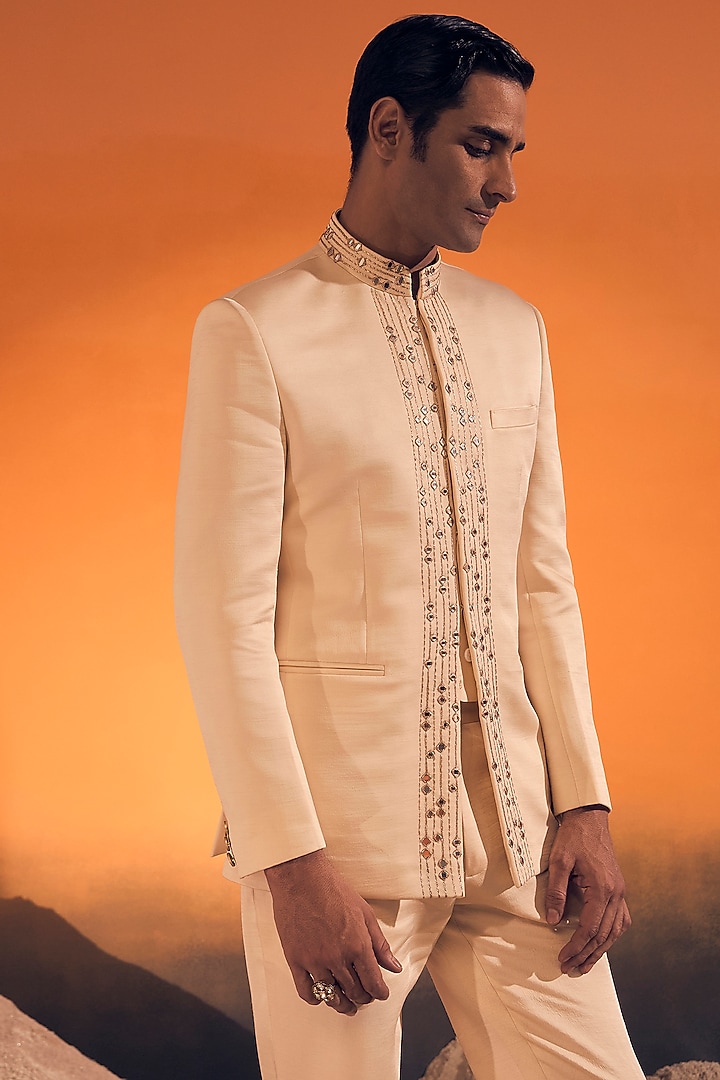 Ivory Raw Silk Satin Zari Embroidered Bandhgala by Philocaly at Pernia's Pop Up Shop