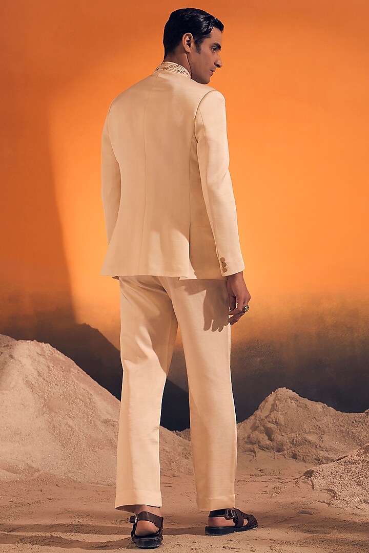 Ivory Raw Silk Satin Zari Embroidered Wedding Bandhgala Set by Philocaly at Pernia's Pop Up Shop