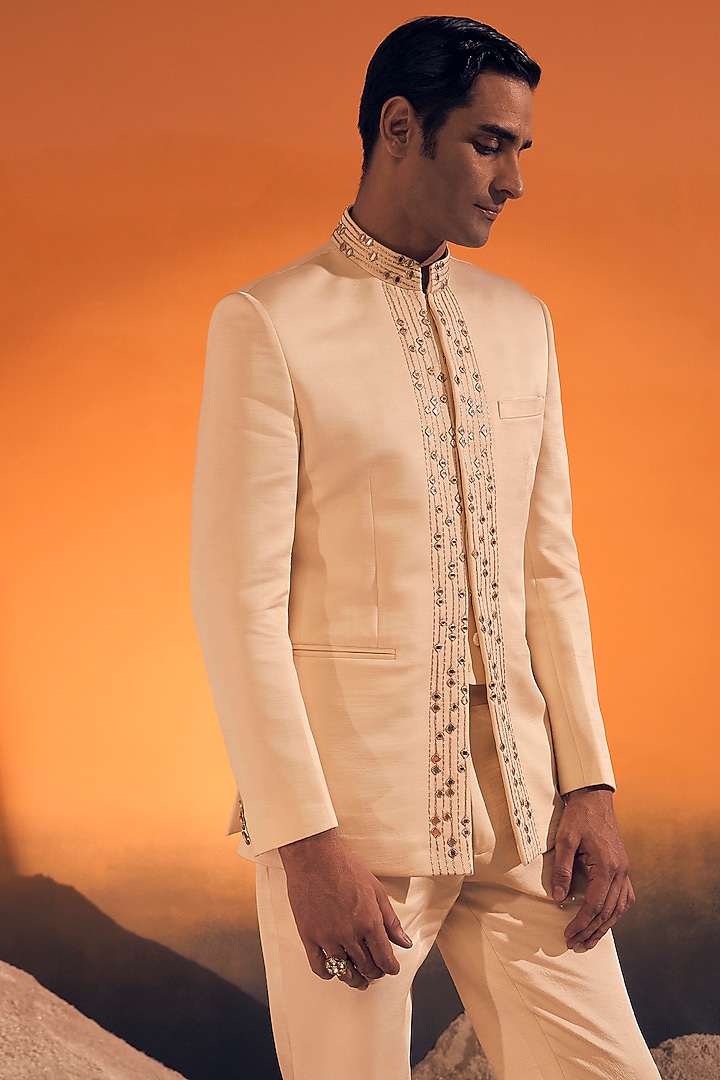 Ivory Raw Silk Satin Zari Embroidered Wedding Bandhgala Set by Philocaly at Pernia's Pop Up Shop