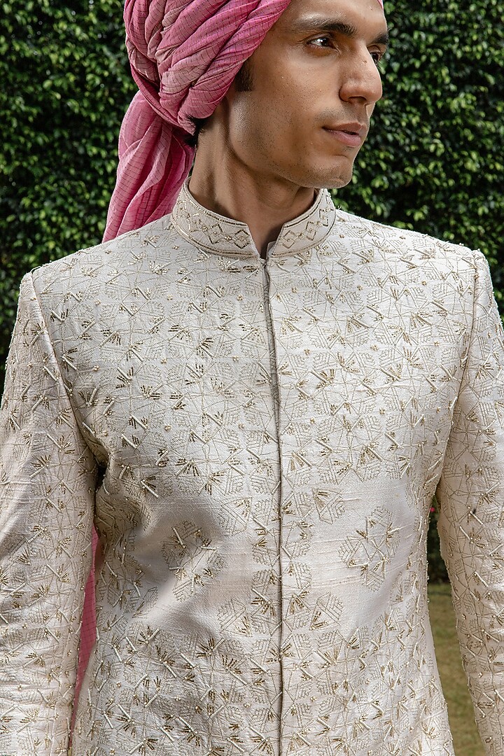 Off-White Raw Silk Bead Embellished Groom Sherwani Set by Philocaly at Pernia's Pop Up Shop