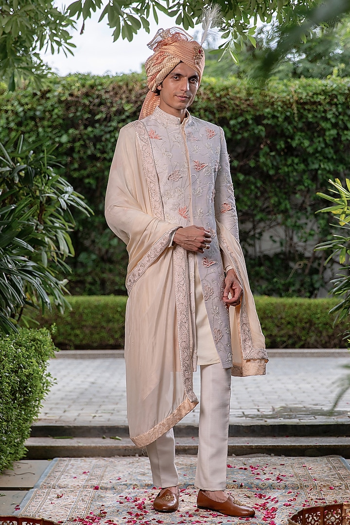 Off-White Raw Silk Floral Motif Embroidered Groom Sherwani Set by Philocaly at Pernia's Pop Up Shop