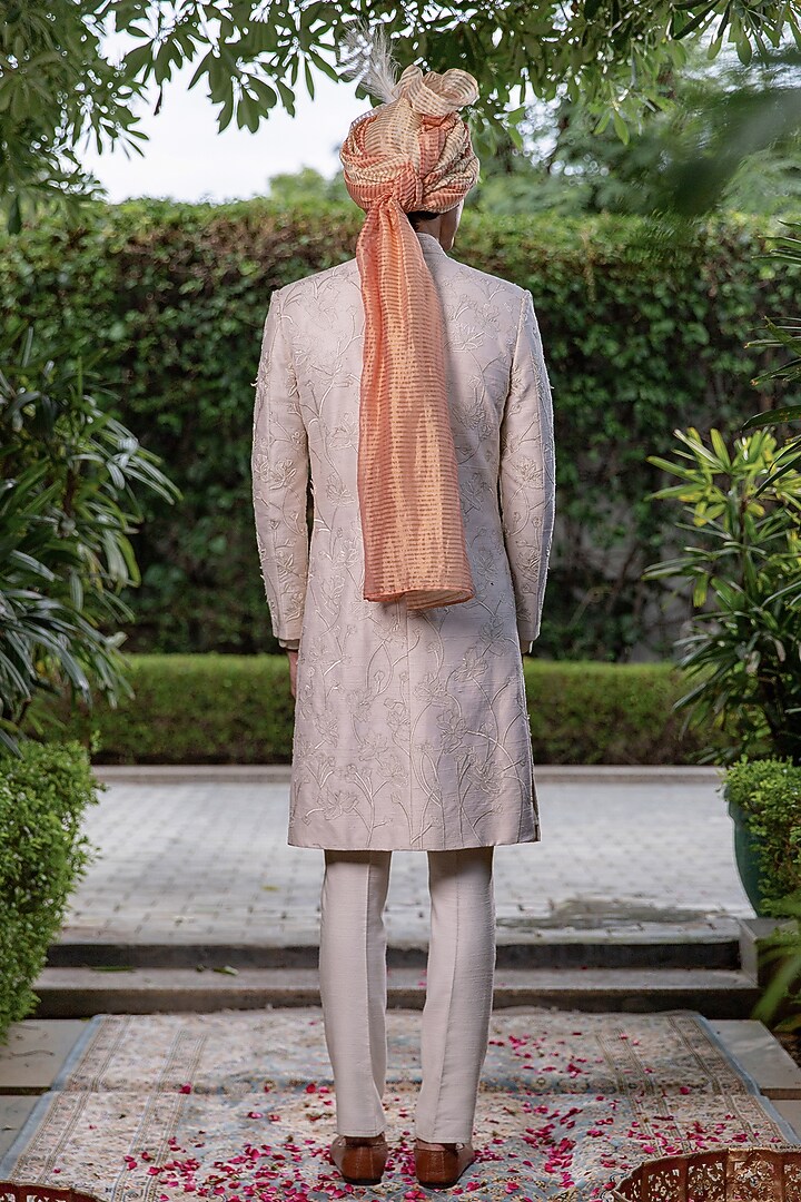 Off-White Raw Silk Floral Motif Embroidered Groom Sherwani Set by Philocaly at Pernia's Pop Up Shop