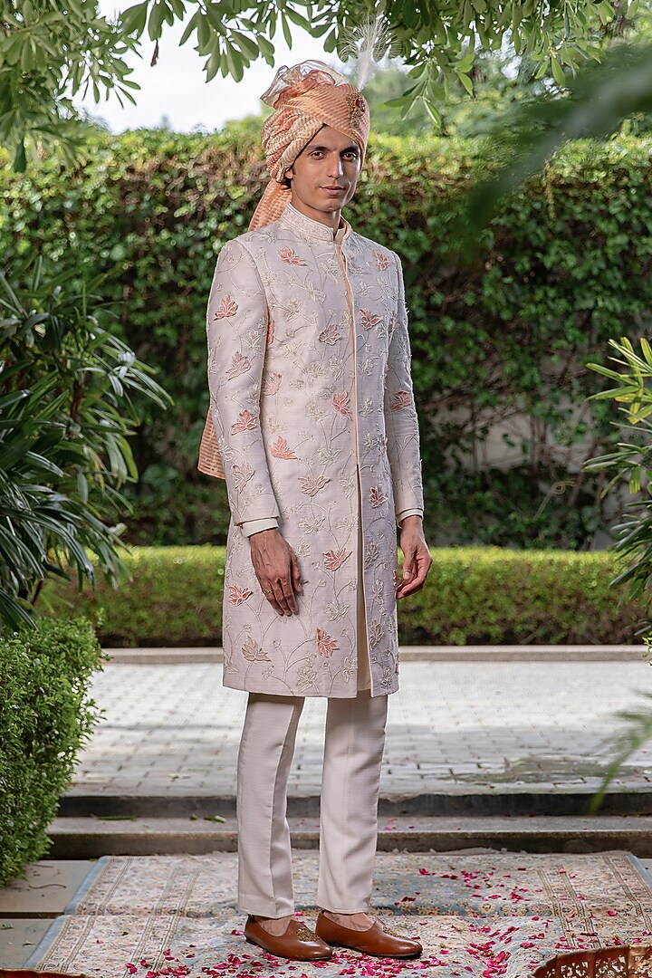 Off-White Raw Silk Floral Motif Embroidered Groom Sherwani Set by Philocaly at Pernia's Pop Up Shop
