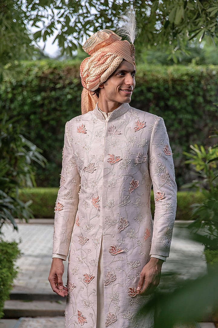 Off-White Raw Silk Floral Motif Embroidered Groom Sherwani Set by Philocaly at Pernia's Pop Up Shop